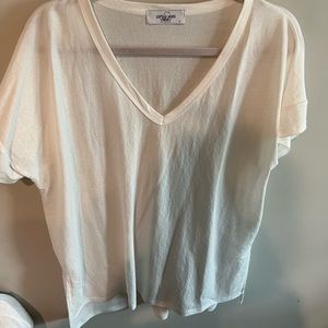 Carly Jean white V neck w/ bottom detail
